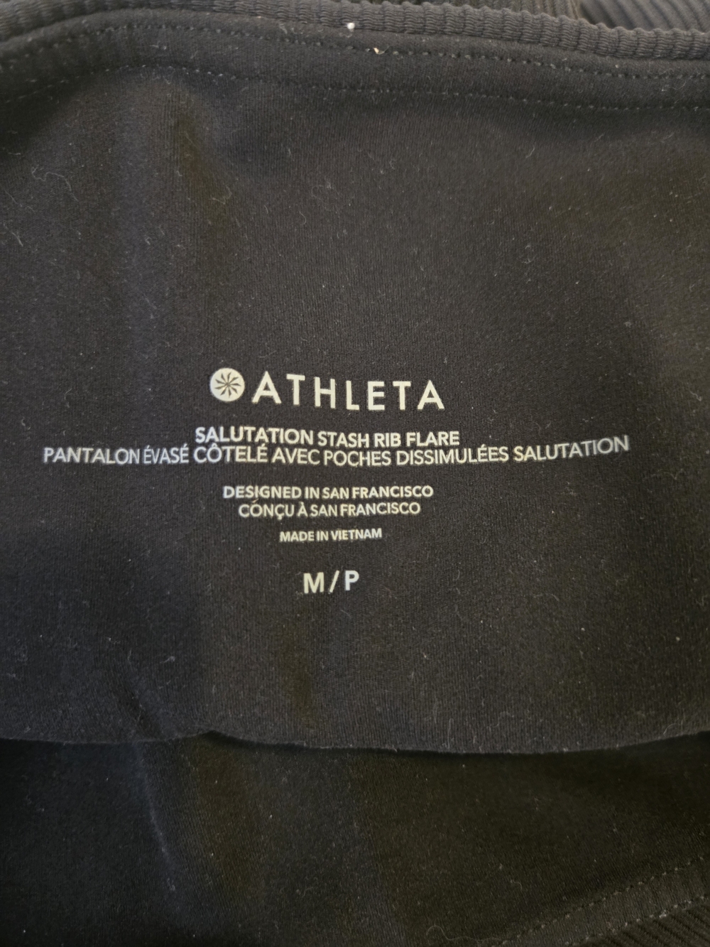 Athleta Salutation Stash Rib Flare Black Pants Size M Petite - Picture 3 of 15